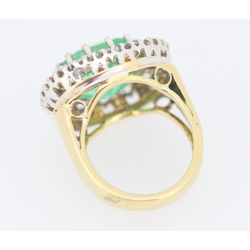 121 - Finely Detailed Emerald Centre Stone Set Ring with Diamond Twelve Stone Halo Set Surround Mounted in... 