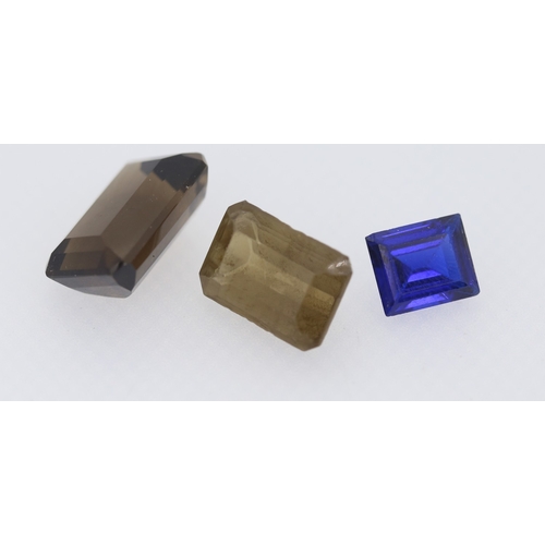 123 - Three Gemstones Including Smoky Quartz