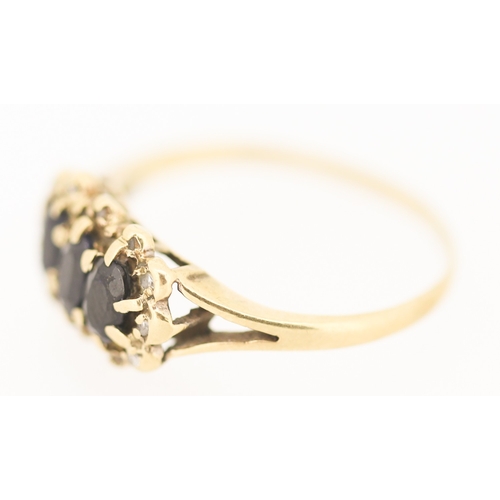 127 - Sapphire Three Stone Set Ring with Diamond Set Surround Mounted in 9 Carat Yellow Gold Ring Size N a... 