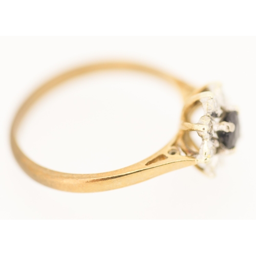 128 - Sapphire and Diamond Set Ladies Daisy Cluster Ring  Mounted in 9 Carat Yellow Gold Ring Size M