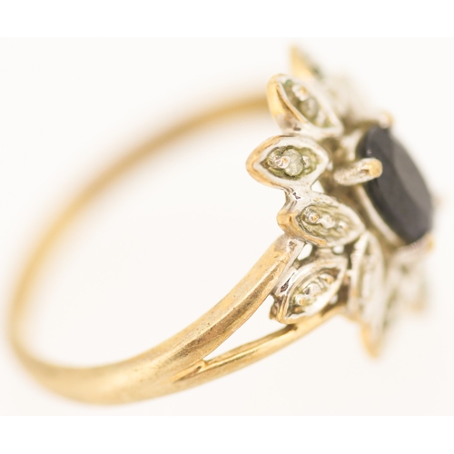 129 - Sapphire and Diamond Set Floral Motif Ring Mounted in 9 Carat Yellow Gold Ring Size L and a Half