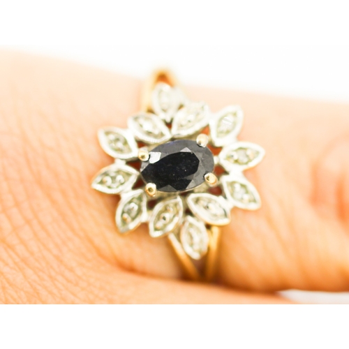 129 - Sapphire and Diamond Set Floral Motif Ring Mounted in 9 Carat Yellow Gold Ring Size L and a Half