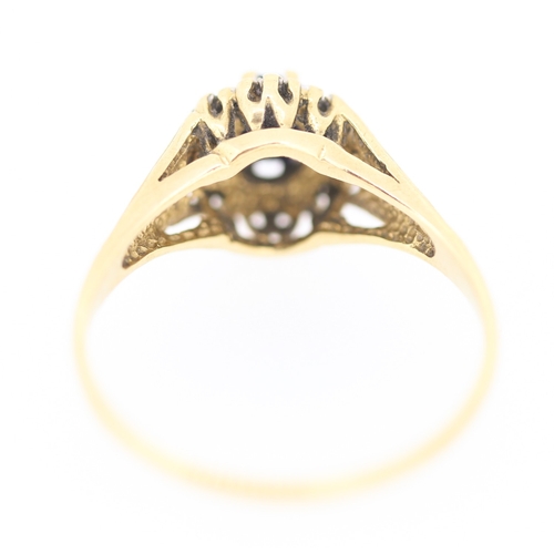 131 - Sapphire Set Ring with Diamond Set Surround Mounted in 9 Carat Yellow Gold Ring Size S