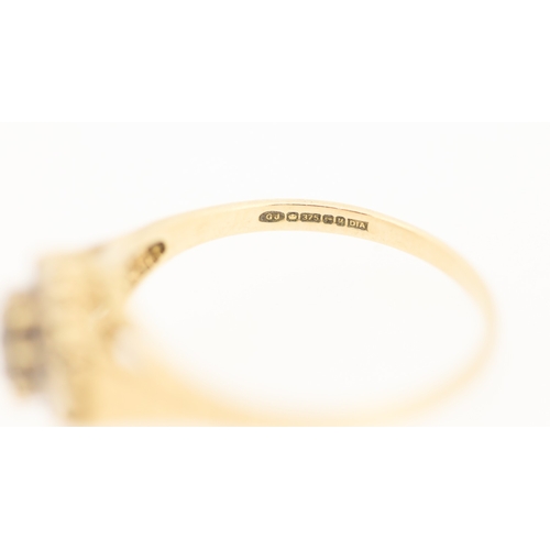 131 - Sapphire Set Ring with Diamond Set Surround Mounted in 9 Carat Yellow Gold Ring Size S
