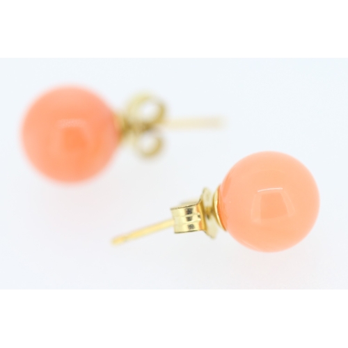 133 - Pair of Coral Bead Set Earrings Mounted on 9 Carat Yellow Gold