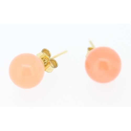 133 - Pair of Coral Bead Set Earrings Mounted on 9 Carat Yellow Gold