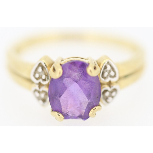134 - Amethyst Set Ring with Diamond Inset to Shoulders Mounted in 9 Carat Yellow Gold Ring Size N