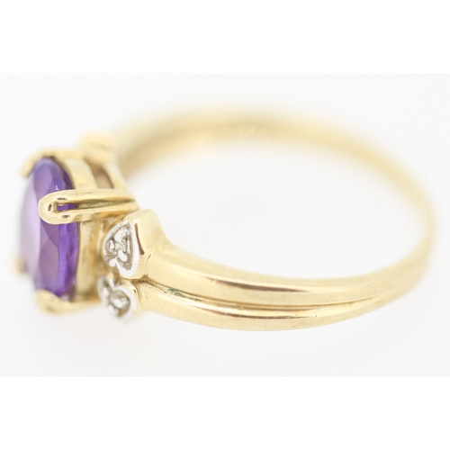 134 - Amethyst Set Ring with Diamond Inset to Shoulders Mounted in 9 Carat Yellow Gold Ring Size N