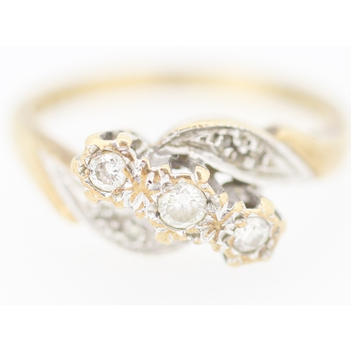 139 - Finely Detailed Diamond Three Stone Ring Mounted in 9 Carat Yellow Gold with Further Diamond Insets ... 