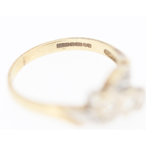 139 - Finely Detailed Diamond Three Stone Ring Mounted in 9 Carat Yellow Gold with Further Diamond Insets ... 