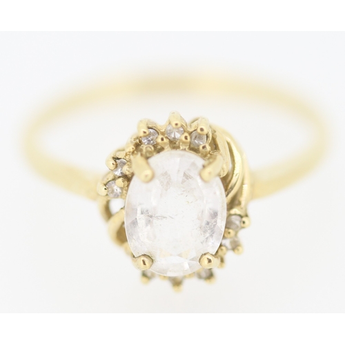 140 - Gemset Ring with Further Gemstone Inset Mounted in 9 Carat Yellow Gold Ring Size N