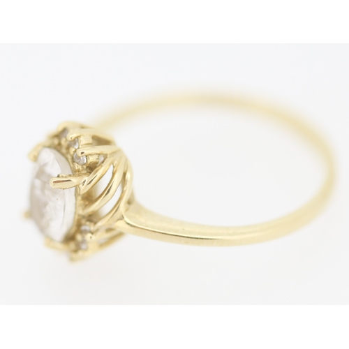 140 - Gemset Ring with Further Gemstone Inset Mounted in 9 Carat Yellow Gold Ring Size N