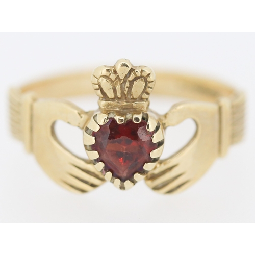 145 - Red Garnet Set Claddagh Ring Mounted in 9 Carat Yellow Gold Ring Size U