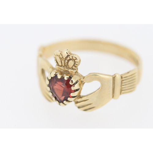 145 - Red Garnet Set Claddagh Ring Mounted in 9 Carat Yellow Gold Ring Size U