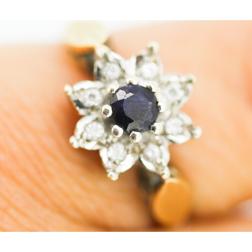 152 - Sapphire and Diamond Set Daisy Cluster Ring Mounted in 9 Carat Yellow Gold Ring Size L