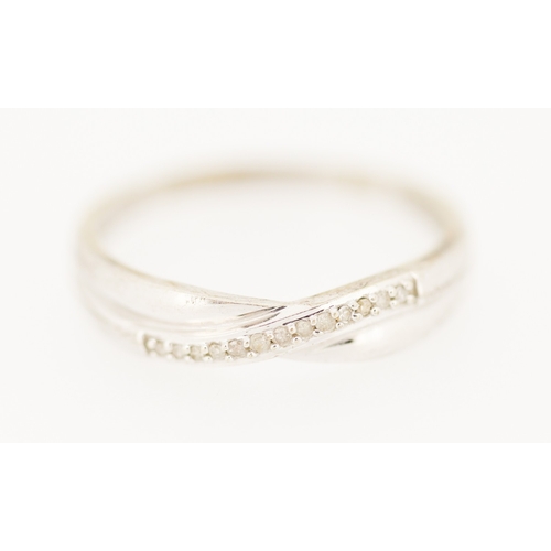 156 - Diamond Set Crossover Form Ring Mounted in 9 Carat White Gold Ring Size O