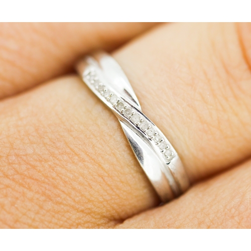 156 - Diamond Set Crossover Form Ring Mounted in 9 Carat White Gold Ring Size O