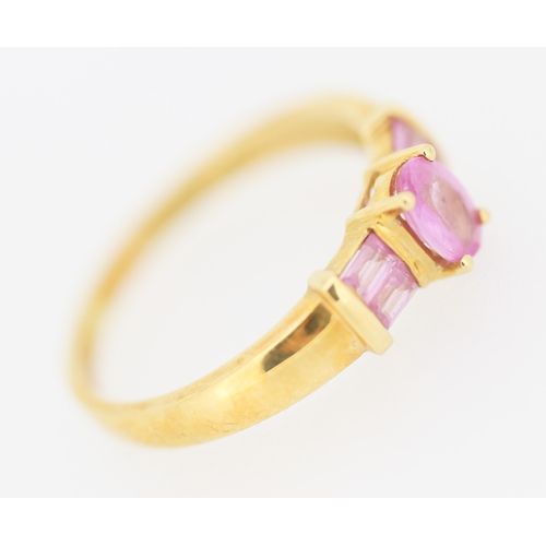 170 - Oval Cut Pink Sapphire Set Ring with Further Baguette Cut Pink Sapphires Set to Shoulders Mounted in... 