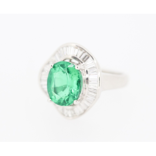 61 - Finely Detailed Emerald Set Centre Stone Ring with Tapered Baguette Cut Diamond Set Halo Surround Mo... 