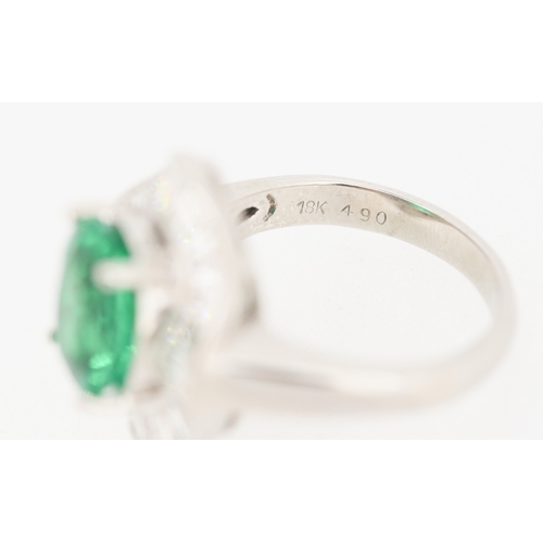 61 - Finely Detailed Emerald Set Centre Stone Ring with Tapered Baguette Cut Diamond Set Halo Surround Mo... 