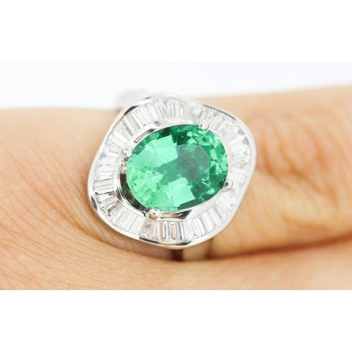 61 - Finely Detailed Emerald Set Centre Stone Ring with Tapered Baguette Cut Diamond Set Halo Surround Mo... 