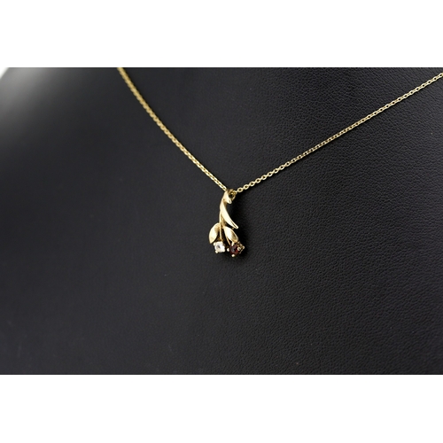 Gemset Floral Motif Pendant Mounted in 9 Carat Yellow Gold 1.5cm High Set on 9 Carat Yellow Gold Chain 46cm Long As New Unworn Shop Stock Inherited by Vendor