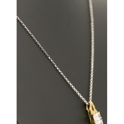 60 - White Topaz Three Stone Set Pendant Mounted in 9 Carat Yellow Gold 2cm High Set on 18 Carat White Go... 