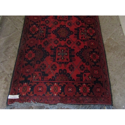 19 - Persian Pure New Wool Runner Burgundy and Navy Ground Approximately 10ft 6 Inches Long