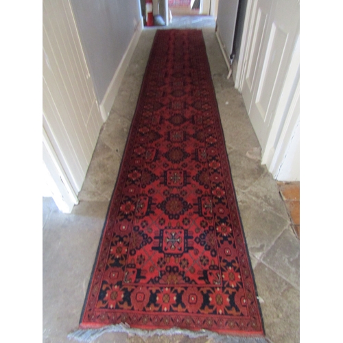 19 - Persian Pure New Wool Runner Burgundy and Navy Ground Approximately 10ft 6 Inches Long
