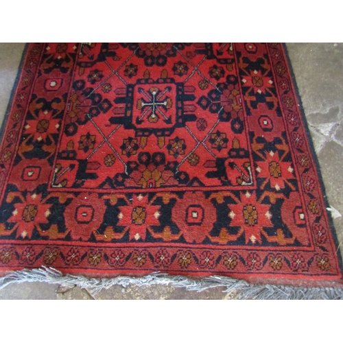 19 - Persian Pure New Wool Runner Burgundy and Navy Ground Approximately 10ft 6 Inches Long