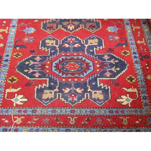 20 - Persian Pure Wool Rug Burgundy and Navy Ground Patterned Borders Approximately 6ft Long x 3ft 6 Inch... 
