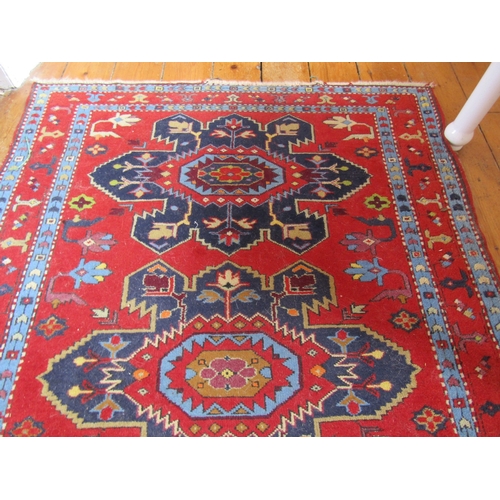 20 - Persian Pure Wool Rug Burgundy and Navy Ground Patterned Borders Approximately 6ft Long x 3ft 6 Inch... 