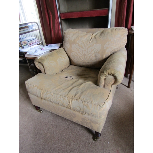38 - Large Over Sized Drawing Room Armchair Mahogany Supports Brass Cup Casters