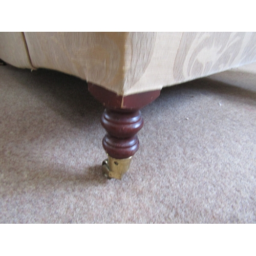 38 - Large Over Sized Drawing Room Armchair Mahogany Supports Brass Cup Casters