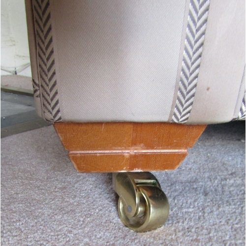 40 - Designer Two Seat Settee Scroll Arm Sides Above Brass Casters Approximately 6ft 6 Inches Wide