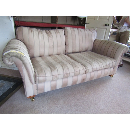 40 - Designer Two Seat Settee Scroll Arm Sides Above Brass Casters Approximately 6ft 6 Inches Wide