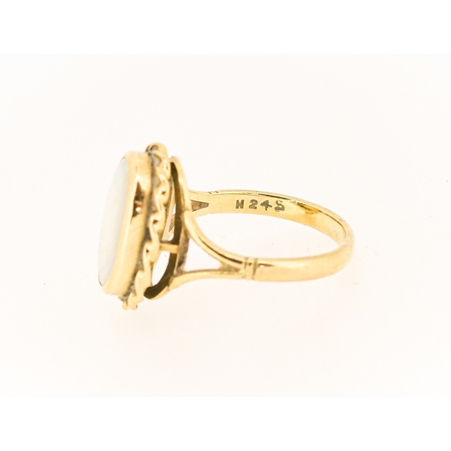 16 - Bezel Set Opal Single Stone Ring Mounted in 9 Carat Yellow Gold Opal 14mm by 10mm Ring Size N and a ... 