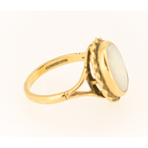 16 - Bezel Set Opal Single Stone Ring Mounted in 9 Carat Yellow Gold Opal 14mm by 10mm Ring Size N and a ... 