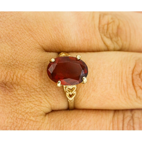 19 - Garnet Single Stone Set Ring Mounted in 9 Carat Yellow Gold Heart Motifs to Shoulders Garnet 14mm by... 