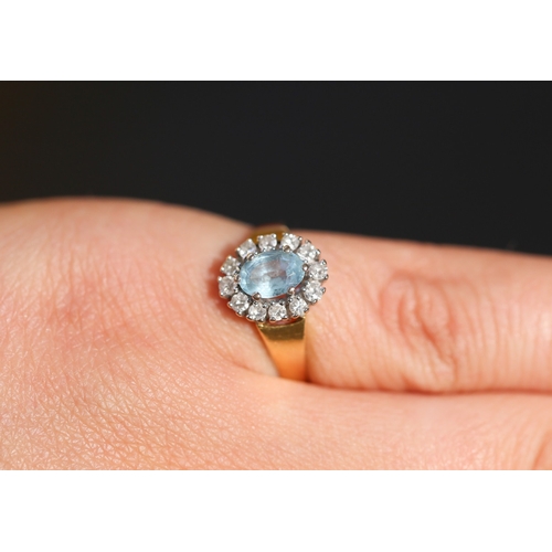 24 - Aquamarine Centre Stone Set Ring with Diamond Set Halo Surround Mounted in 18 Carat Yellow Gold Aqua... 