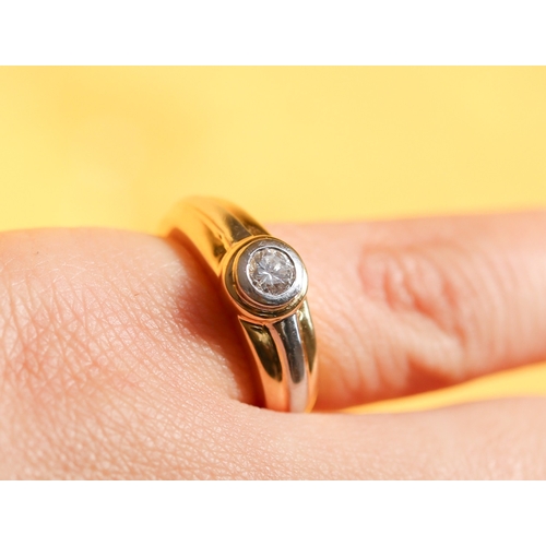 25 - Diamond Solitaire Bezel Set Ring Mounted on 18 Carat Yellow and White Gold Diamond Approximately .50... 