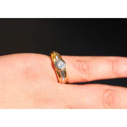 25 - Diamond Solitaire Bezel Set Ring Mounted on 18 Carat Yellow and White Gold Diamond Approximately .50... 