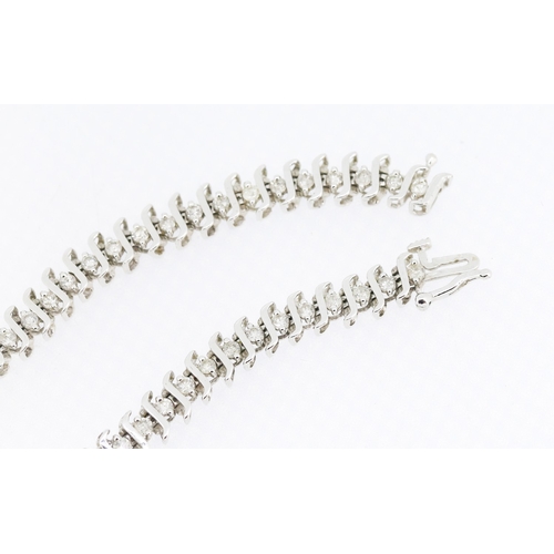29 - Diamond Fifty Four Stone Set S Link Tennis Bracelet Mounted in 14 Carat White Gold 18cm Long Total W... 