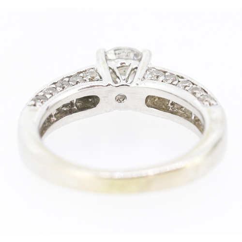 33 - Finely Detailed Diamond Set Ring with Further Diamonds Set to Shoulders Mounted in 14 Carat White Go... 