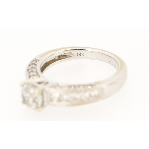 33 - Finely Detailed Diamond Set Ring with Further Diamonds Set to Shoulders Mounted in 14 Carat White Go... 