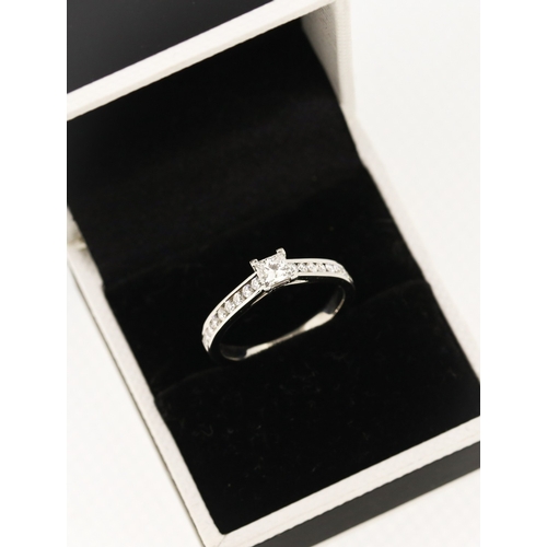 36 - Square Brilliant Cut Solitaire with Further Diamonds Set to Band Mounted in Platinum Main Diamond 0.... 