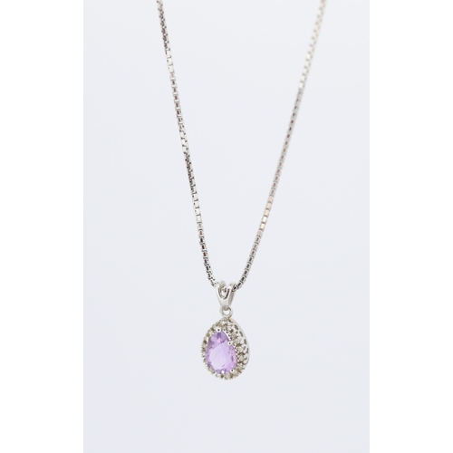 Pear Cut Amethyst Set Pendant with Diamond Set Surround Mounted in 9 Carat White Gold 1cm High Set on 9 Carat White Gold Chain 44cm Long