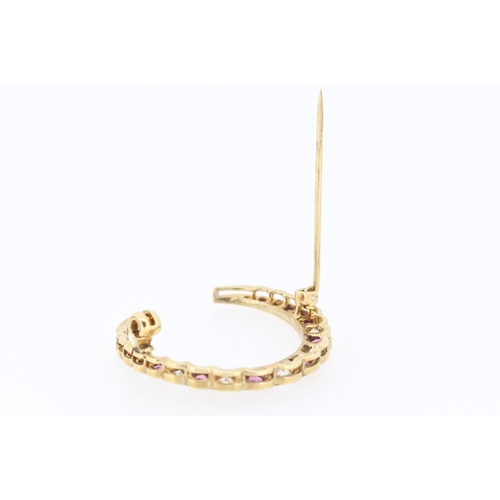 4 - Ruby and White Topaz Twenty One Stone Set Graduated Form Crescent Brooch Mounted in 9 Carat Yellow G... 
