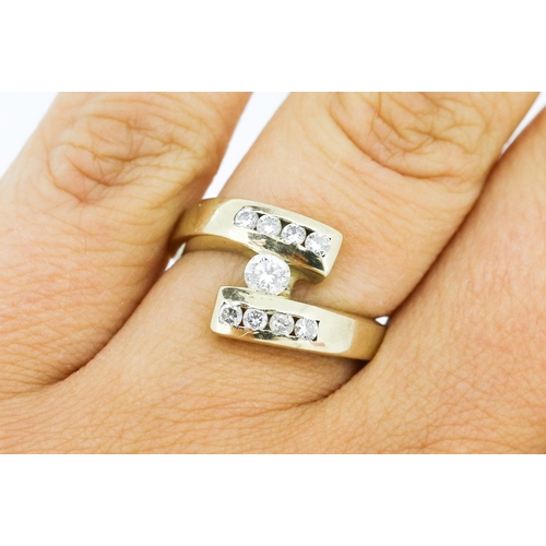 45 - Diamond Centre Stone Wrap Around Form Ring with Four Stone Diamonds Set to Each Size Mounted in 18 C... 