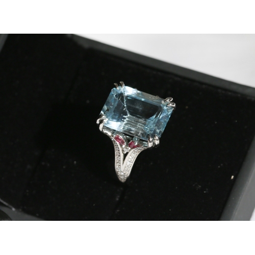 51 - Finely Detailed Emerald Cut Aquamarine Set Ring with Diamond Inset to Shoulders and Further Ruby Ins... 